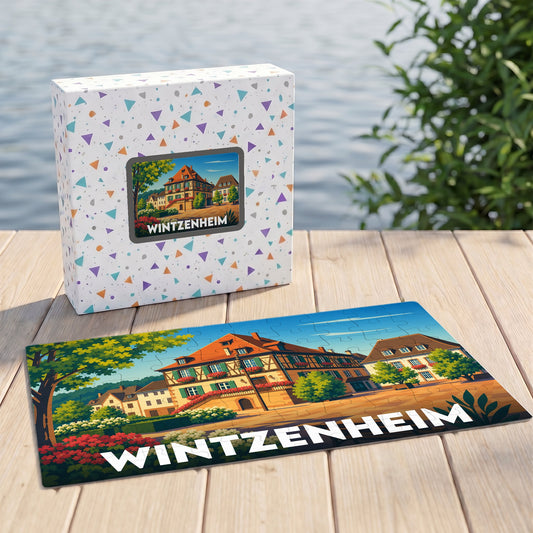 Puzzle souvenir de la ville de Wintzenheim avec une illustration colorée de maisons à colombages.