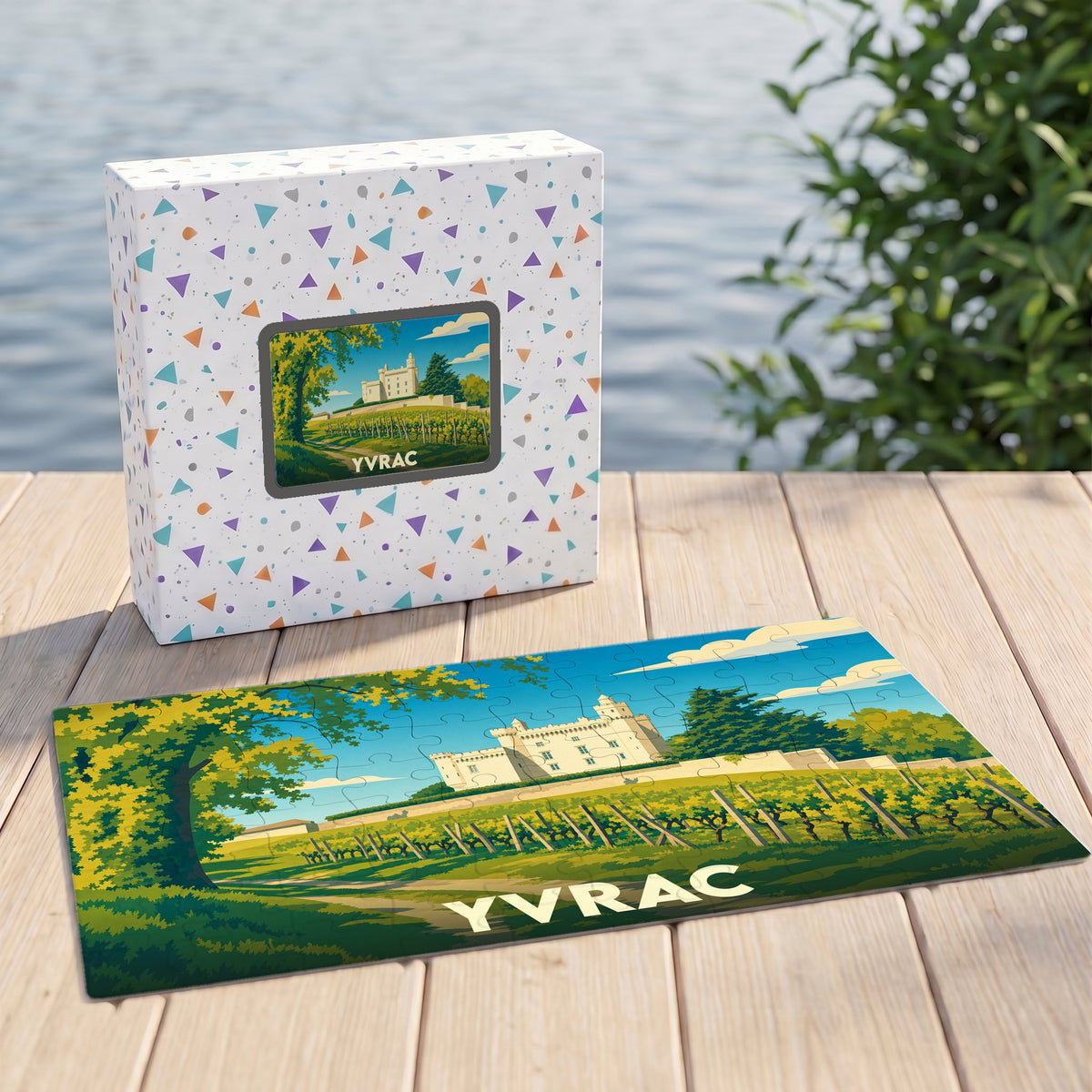 Puzzle souvenir de la ville d'Yvrac illustrant un château et son vignoble dans un style graphique.