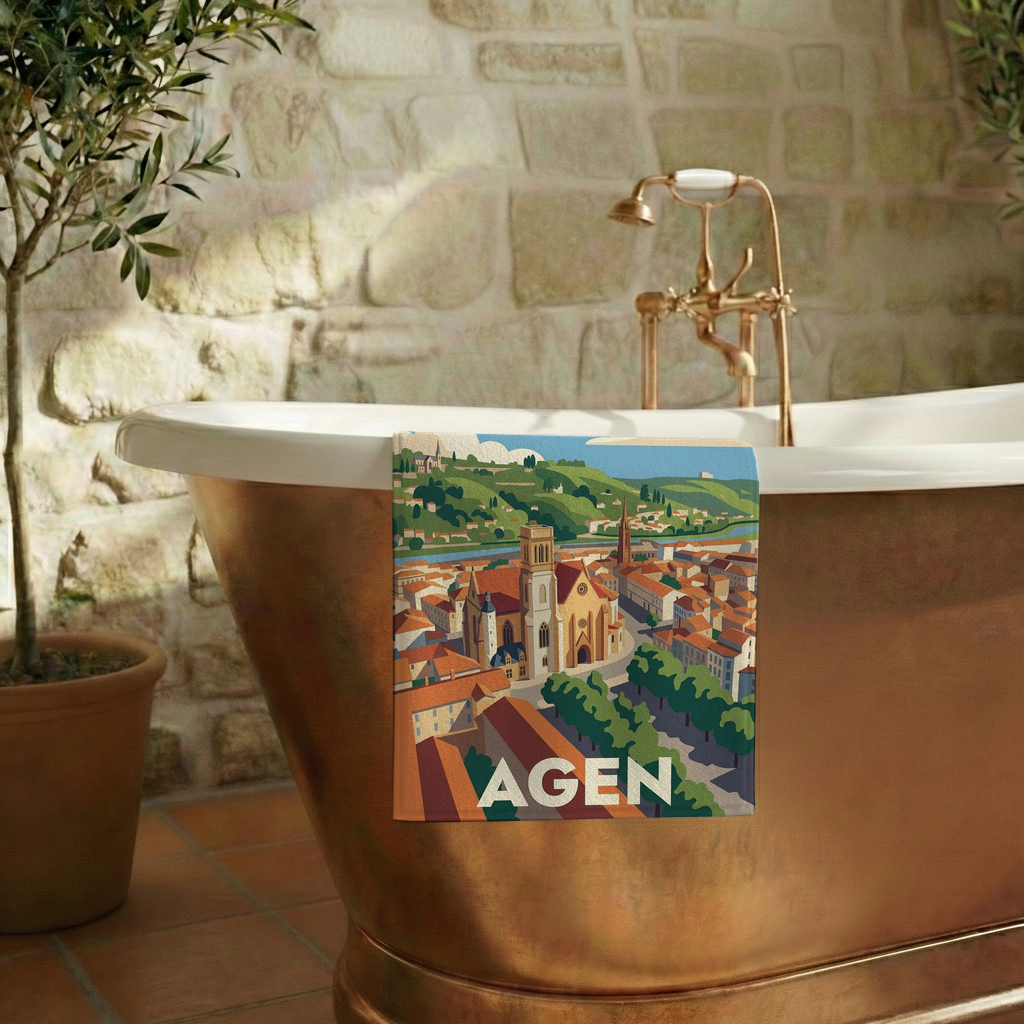Serviette de bain souvenir de la ville d'Agen avec une illustration stylisée.