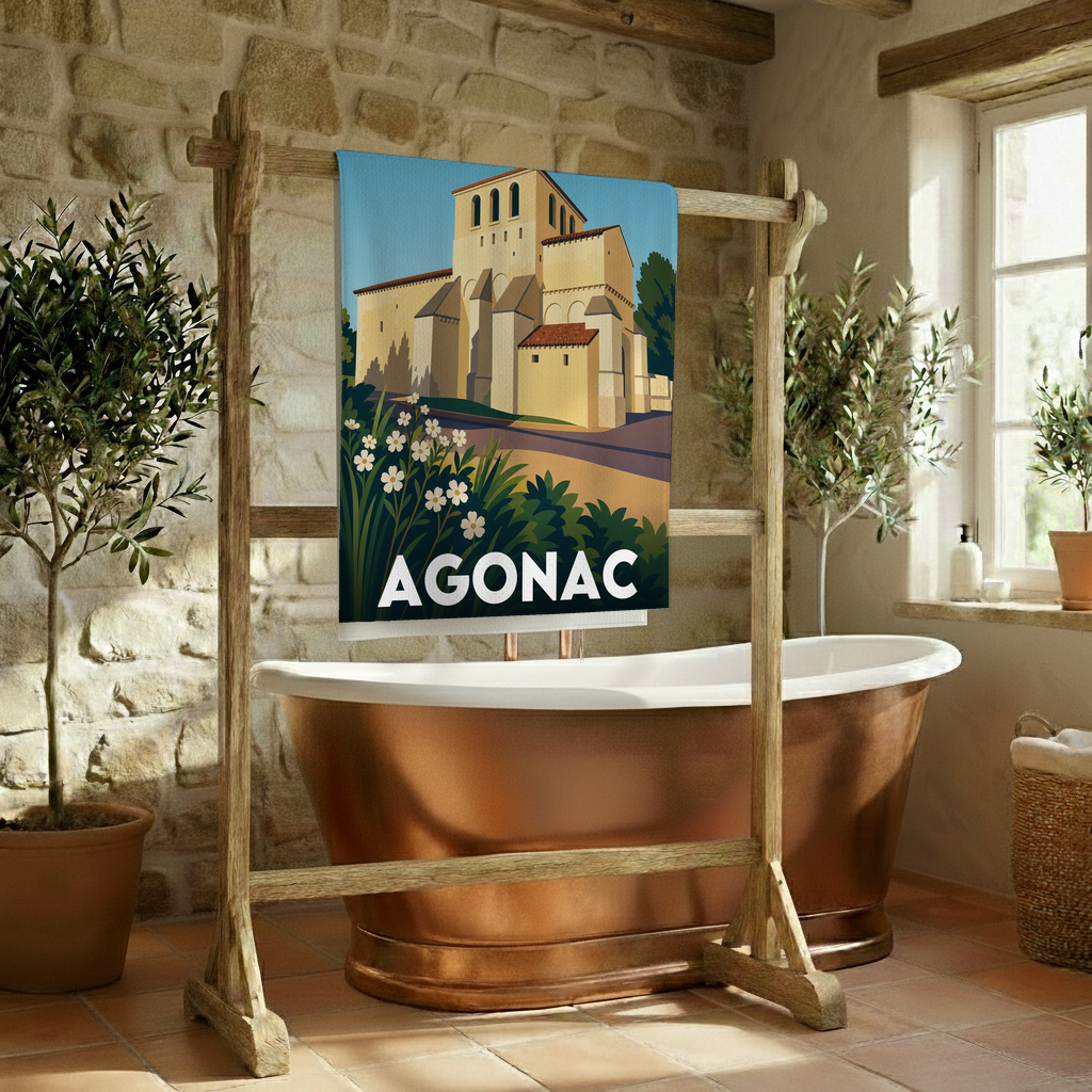 Serviette de bain souvenir de la ville d'Agonac avec une illustration stylisée.