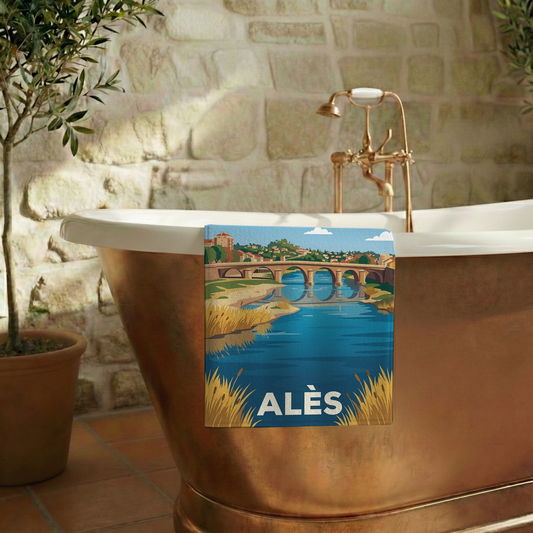 Serviette de bain souvenir de la ville d'Alès avec une illustration stylisée.