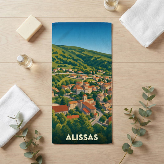 Serviette de bain souvenir de la ville d'Alissas illustrée par un paysage panoramique coloré.