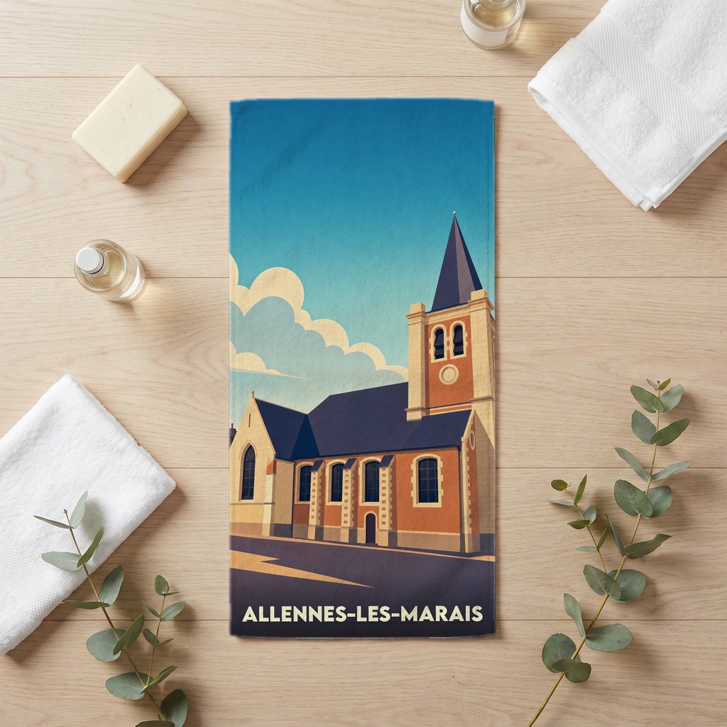 Serviette de bain souvenir de la ville d'Allennes-les-Marais avec une illustration stylisée de son église.
