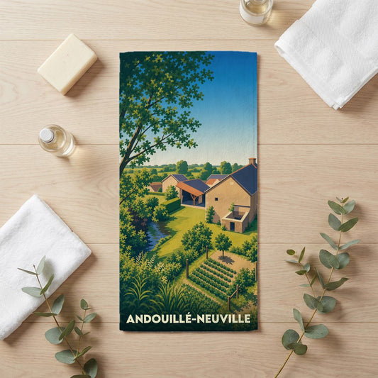 Serviette de bain souvenir de la ville d'Andouillé-Neuville avec une illustration stylisée de son paysage rural.