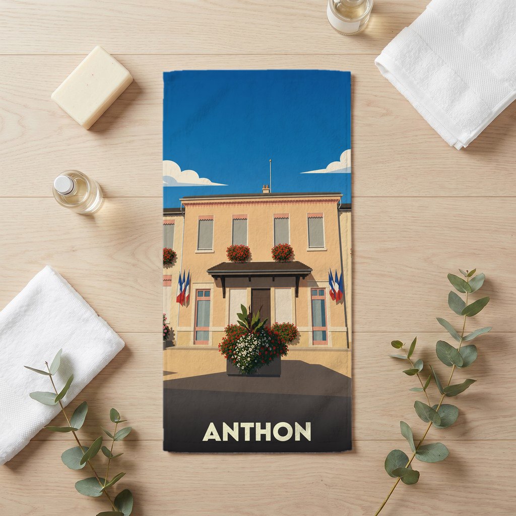 Serviette de bain souvenir de la ville d'Anthon avec une illustration stylisée d'un bâtiment municipal.