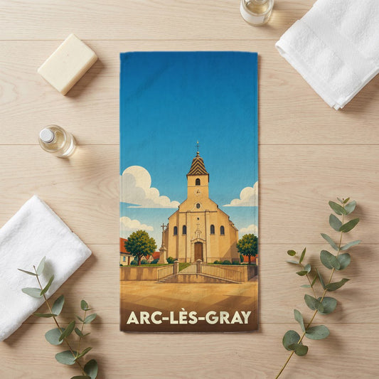 Serviette de bain souvenir de la ville de Arc-lès-Gray avec une illustration stylisée de son église.