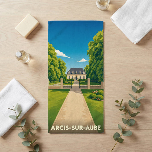 Serviette de bain souvenir de la ville de Arcis-sur-Aube avec une illustration stylisée d'un château.