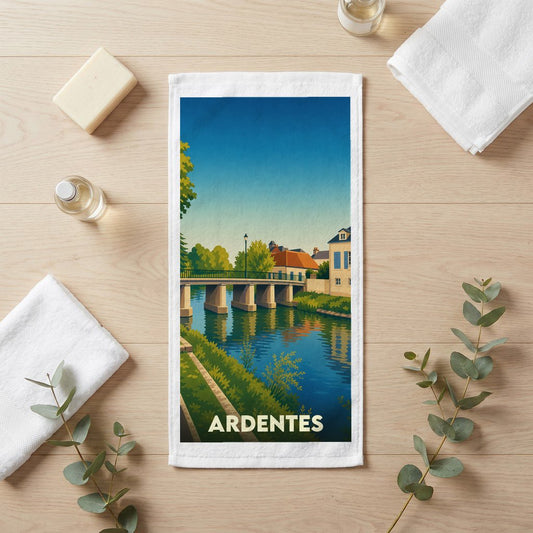 Serviette souvenir de la ville d'Ardentes avec une illustration stylisée représentant un pont sur une rivière.