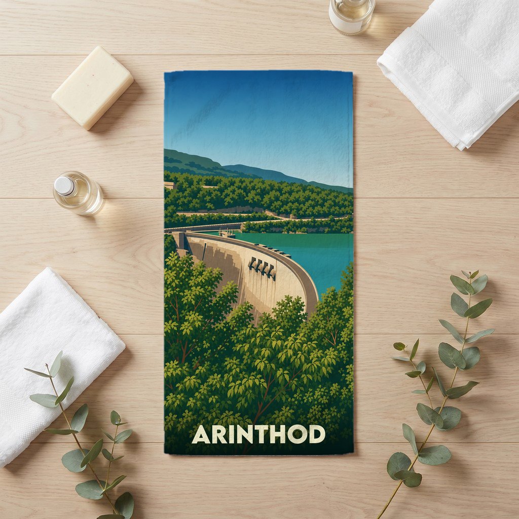 Serviette de bain souvenir de la ville d'Arinthod avec une illustration stylisée du barrage de Vouglans.