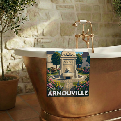 Serviette de bain souvenir de la ville d'Arnouville avec une illustration stylisée d'une fontaine dans un jardin.