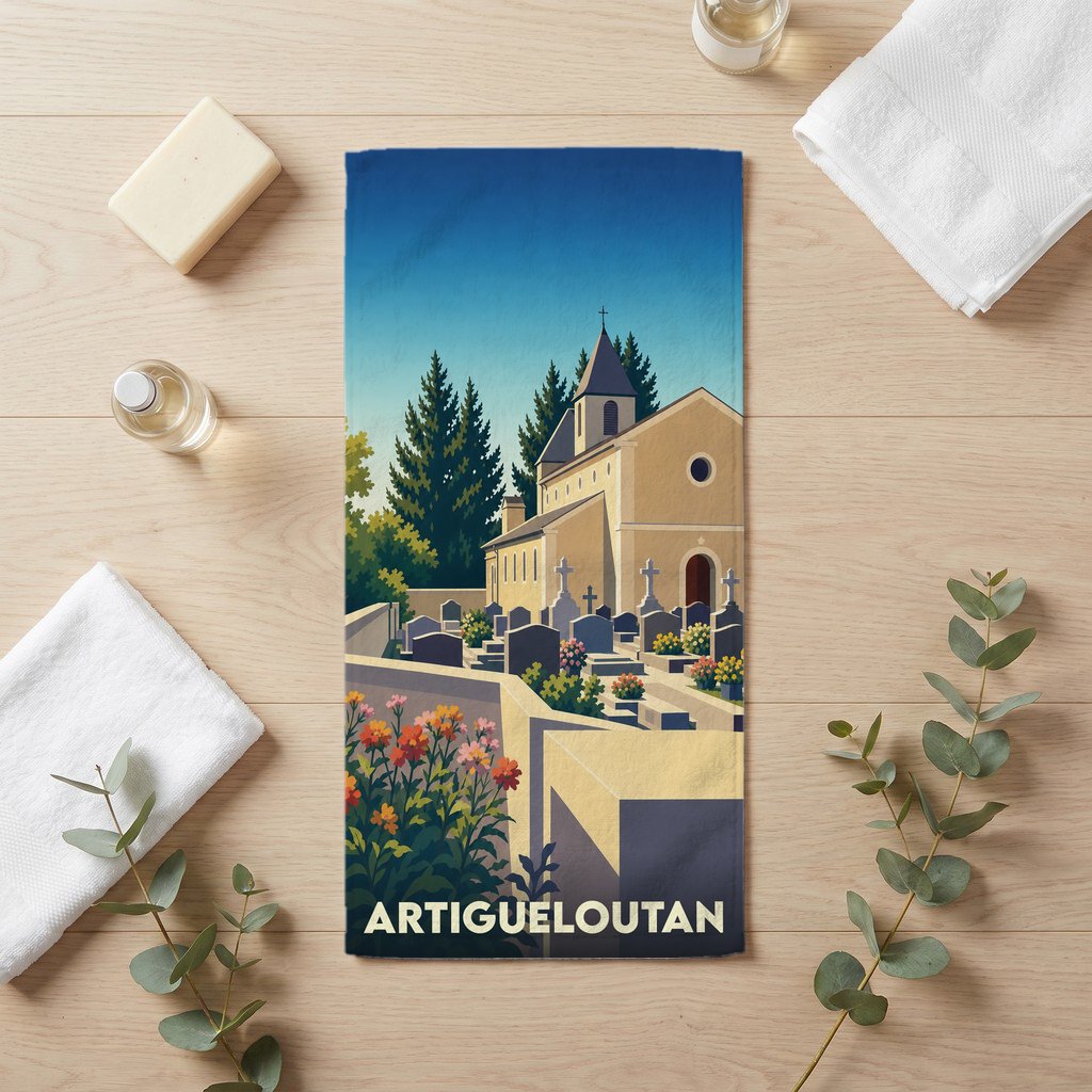Serviette de bain souvenir de la ville d'Artigueloutan illustrée par une église et son cimetière dans un style rétro.