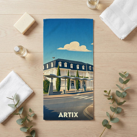 Serviette de bain souvenir de la ville d'Artix avec une illustration stylisée.