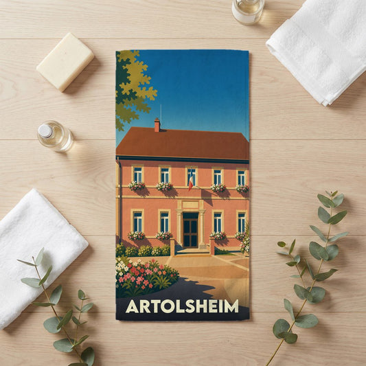 Serviette de bain souvenir de la ville d'Artolsheim avec une illustration stylisée.