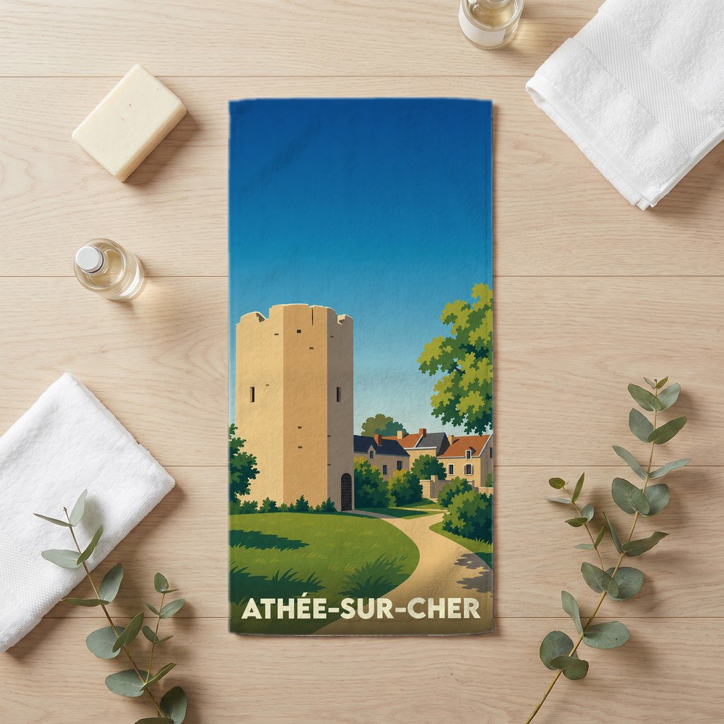 Serviette de bain souvenir de la ville d'Athée-sur-Cher avec une illustration stylisée d'une tour médiévale.