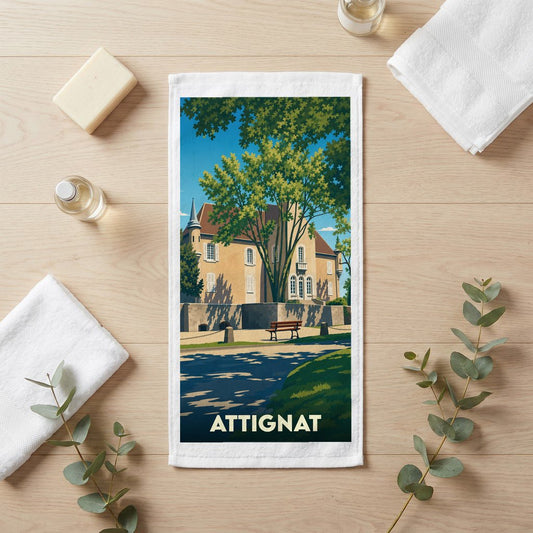 Serviette de bain souvenir de la ville d'Attignat avec une illustration stylisée.