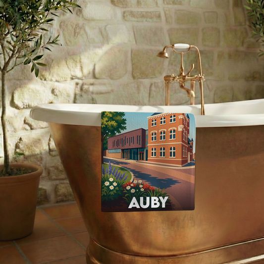 Serviette de bain souvenir de la ville d'Auby avec une illustration stylisée.