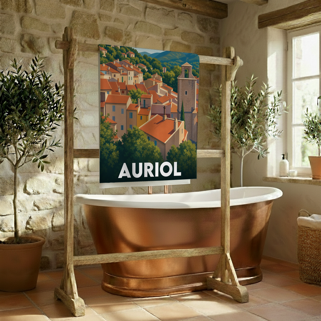 Serviette de bain souvenir de la ville d'Auriol avec une illustration stylisée.