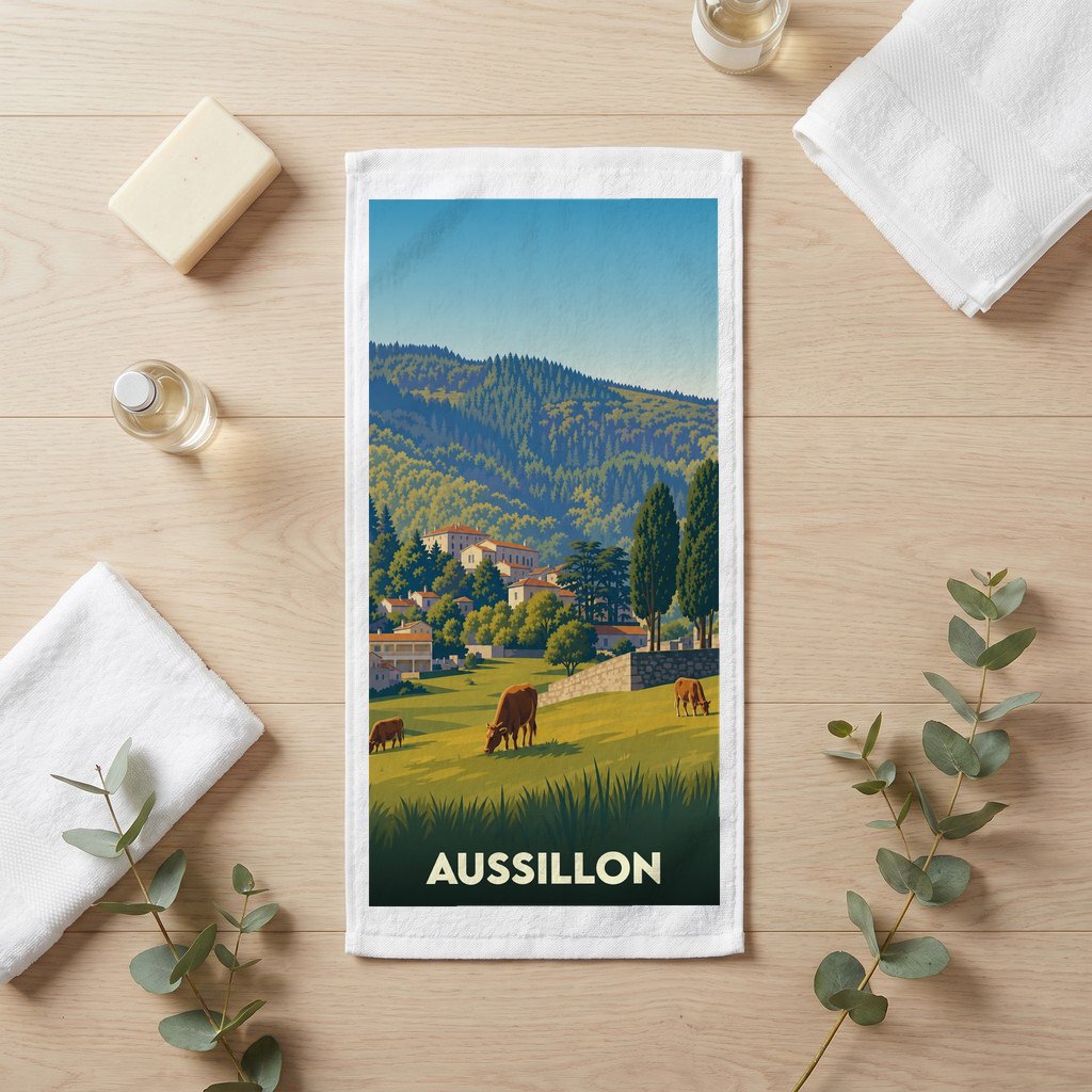Serviette de bain souvenir de la ville d'Aussillon avec une illustration de paysage champêtre.