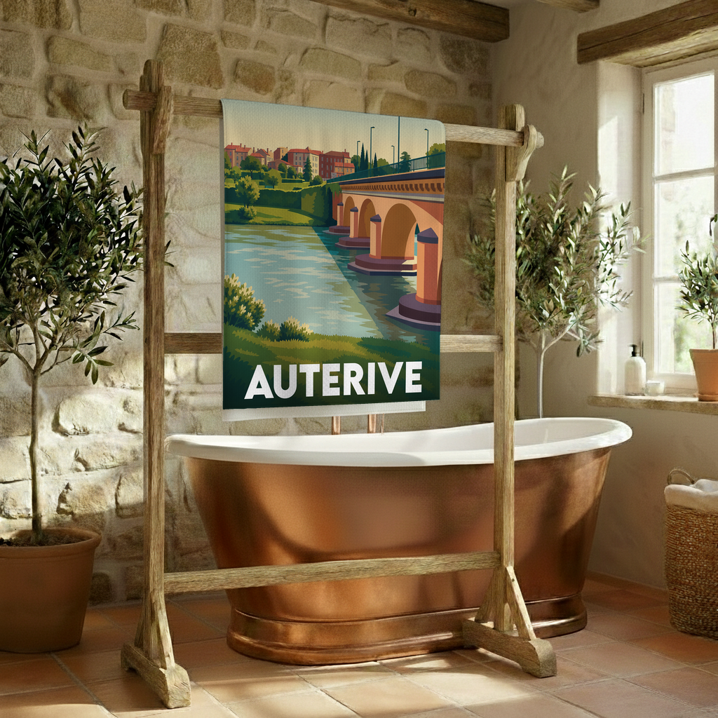 Serviette de bain souvenir de la ville d'Auterive avec une illustration stylisée d'un pont enjambant une rivière.