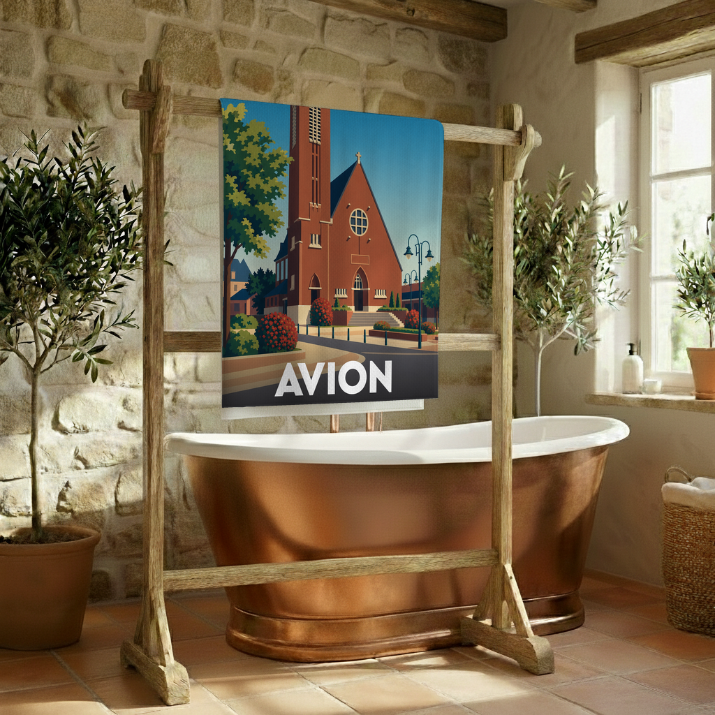 Serviette de bain souvenir de la ville d'Avion ornée d'une illustration stylisée de son église.