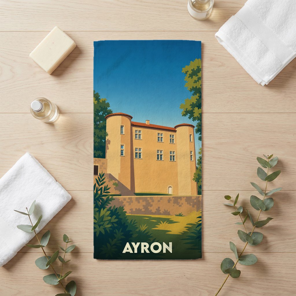 Serviette de bain souvenir de la ville d'Ayron avec une illustration stylisée de son château.