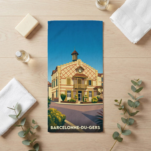 Serviette de bain souvenir de Barcelonne-du-Gers illustrant le bâtiment de la mairie avec un style graphique épuré.