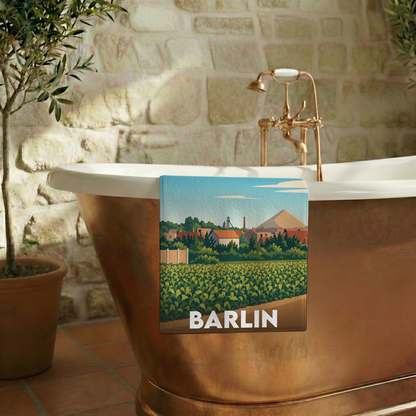 Serviette de bain souvenir de la ville de Barlin avec une illustration stylisée.