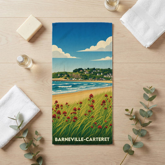 Serviette de bain souvenir de la ville de Barneville-Carteret avec une illustration stylisée de sa côte.