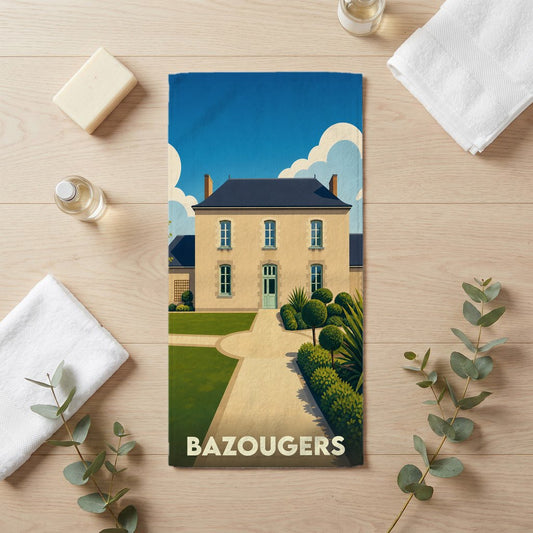 Serviette de bain souvenir de la ville de Bazougers avec une illustration stylisée d'une demeure bourgeoise.