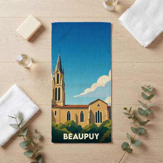 Serviette de bain souvenir de la ville de Beaupuy avec une illustration stylisée de son église.
