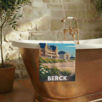 Serviette de bain souvenir de la ville de Berck avec une illustration stylisée.