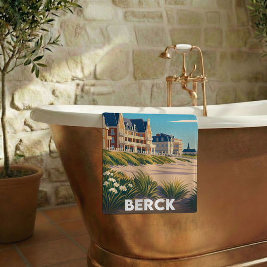 Serviette de bain souvenir de la ville de Berck avec une illustration stylisée.