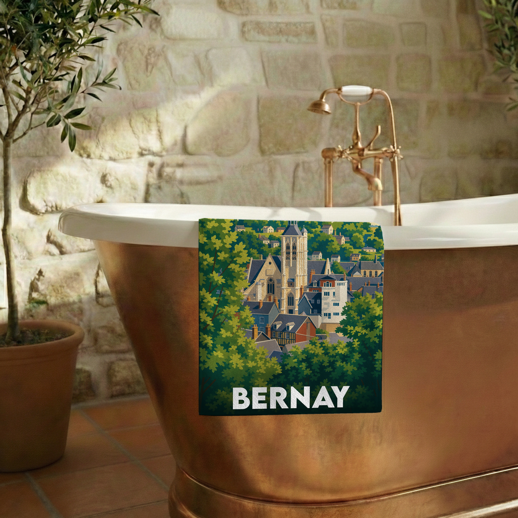 Serviette de bain souvenir de la ville de Bernay avec une illustration de ses toits et de son église.