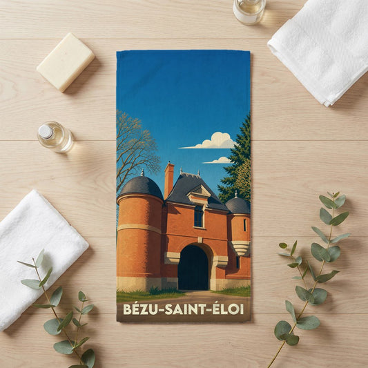 Serviette de bain souvenir de la ville de Bézu-Saint-Éloi avec une illustration stylisée de son architecture.