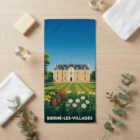 Serviette de bain souvenir de la ville de Bierné-les-Villages avec une illustration stylisée d'un château.