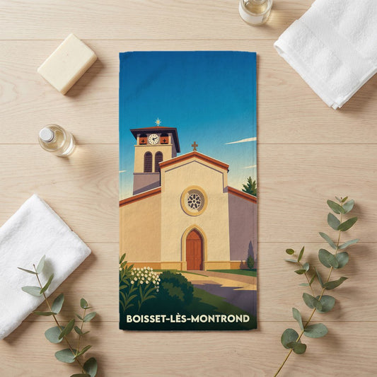 Serviette de bain souvenir de la ville de Boisset-lès-Montrond avec une illustration stylisée de son église.