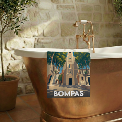 Serviette de bain souvenir de la ville de Bompas avec une illustration stylisée de son église.