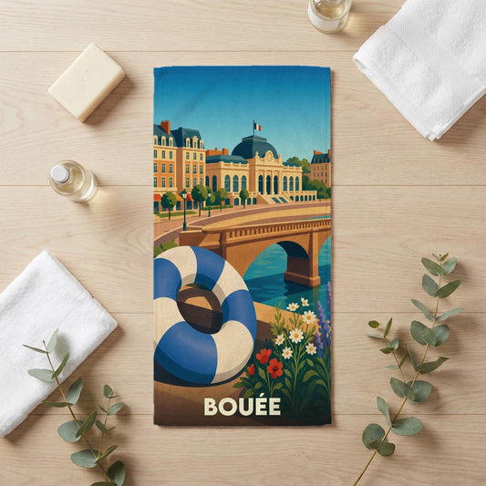 Serviette de bain souvenir de la ville de Bouée avec une illustration stylisée d'un paysage urbain au bord de l'eau.