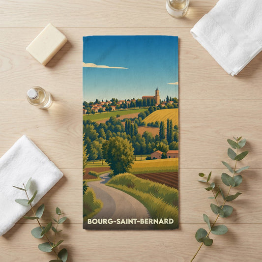 Serviette de bain souvenir de la ville de Bourg-Saint-Bernard avec une illustration stylisée d'un paysage de campagne.