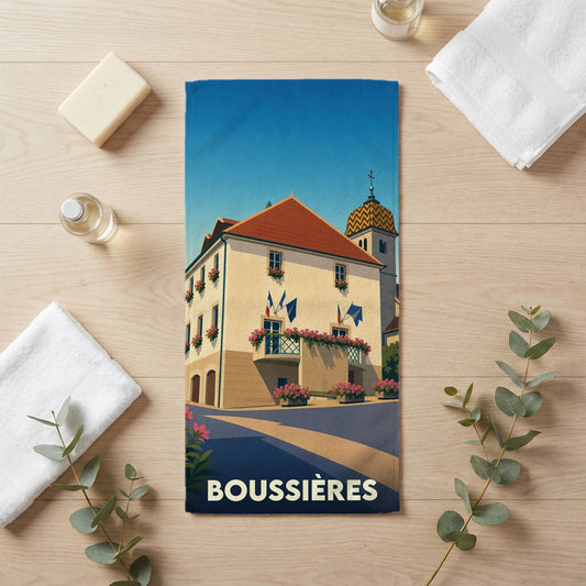 Serviette de bain souvenir de la ville de Boussières avec une illustration stylisée de sa mairie.