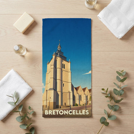 Serviette de bain souvenir de la ville de Bretoncelles avec une illustration stylisée de son église.