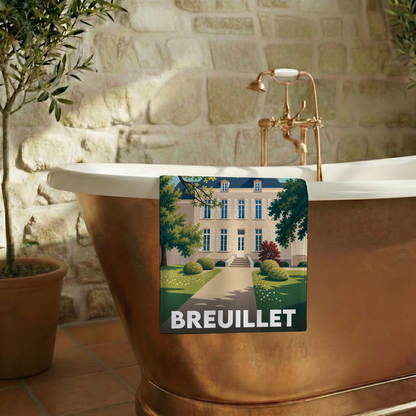 Serviette de bain souvenir de la ville de Breuillet avec une illustration stylisée d'un manoir.