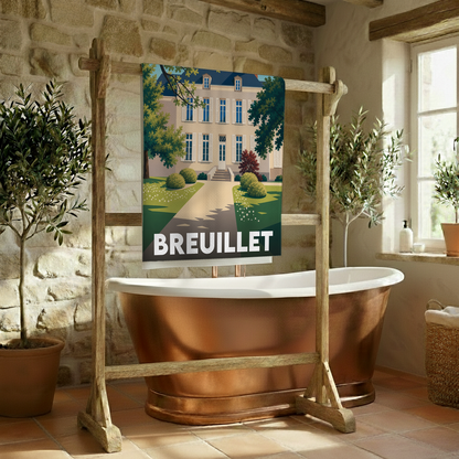 Serviette de bain souvenir de la ville de Breuillet avec une illustration stylisée d'une demeure bourgeoise.