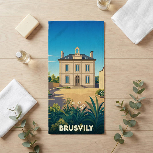 Serviette de bain souvenir de la ville de Brusvily avec une illustration stylisée d'un bâtiment historique.