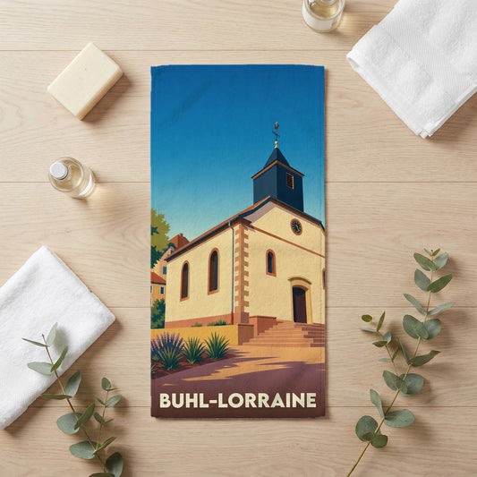 Serviette de bain souvenir de la ville de Buhl-Lorraine avec une illustration stylisée de son église.