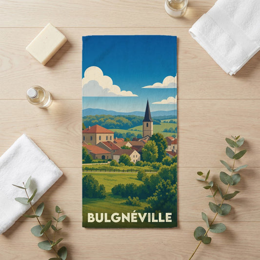 Serviette de bain souvenir de la ville de Bulgnéville avec une illustration paysagère stylisée.