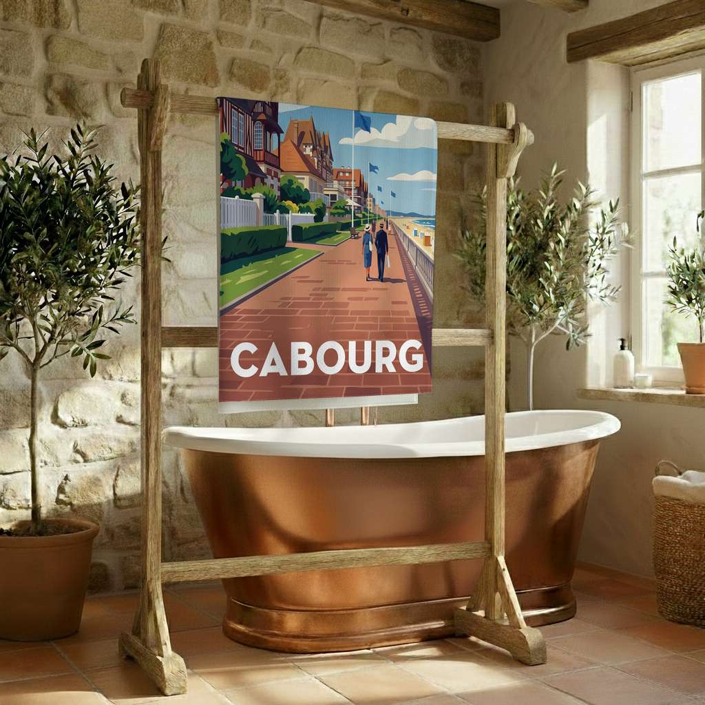 Serviette de bain souvenir de la ville de Cabourg avec une illustration stylisée de son bord de mer.