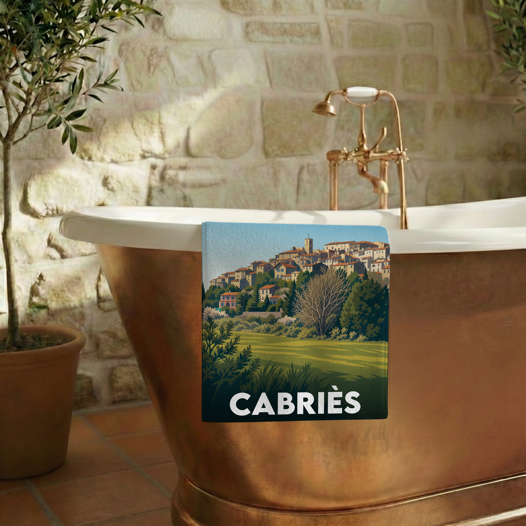 Serviette de bain souvenir de la ville de Cabriès illustrée d'un paysage provençal stylisé.