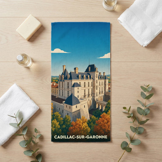 Serviette de bain souvenir de la ville de Cadillac-sur-Garonne avec une illustration stylisée de son château.