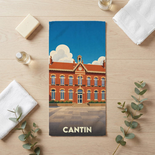 Serviette de bain souvenir de la ville de Cantin avec une illustration stylisée de son architecture.